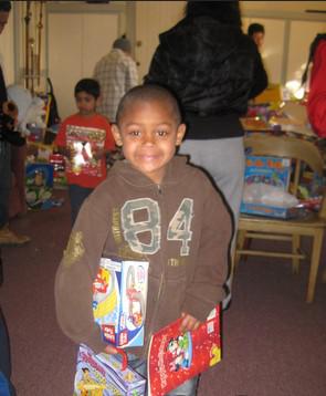 CRECE provides 600+ toys to needy children at our annual Christmas toy drive